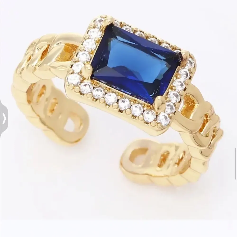 GOLDTONE RESIZABLE COCKTAIL‎ RING WITH PURPLE COLORED STONE
